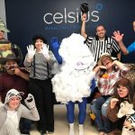 Employees dressed up in Halloween costumes
