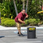 employees having fun outside for company field day