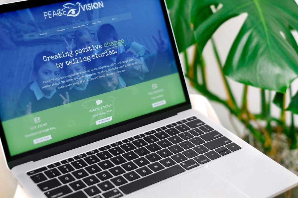 PeaceVision website on a laptop