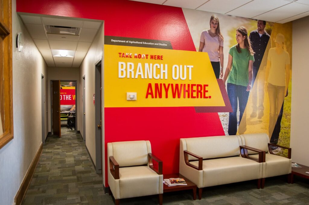 Environmental design for ISU's Department of Agricultural Education and Studies, featuring wall graphics declaring, "Take root here, branch out anywhere."