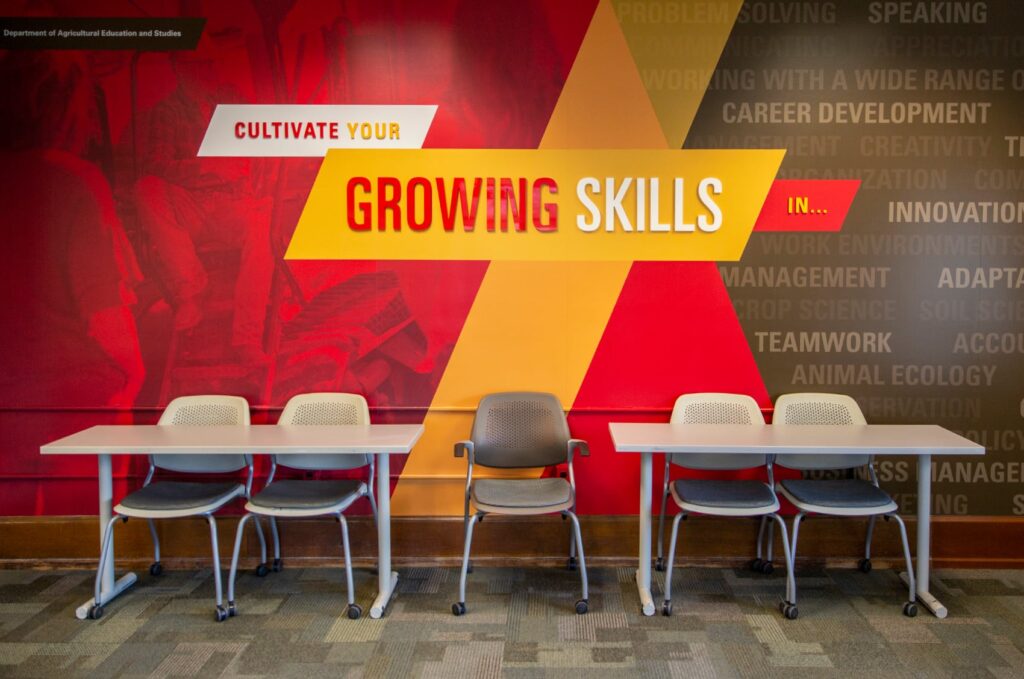 Environmental design for ISU's Department of Agriculture Education and Studies, featuring wall graphics that declare, "Cultivate you growing skills in…"