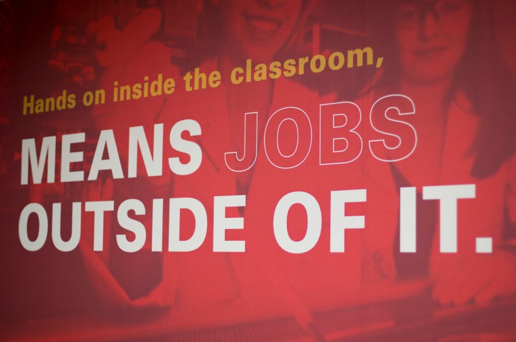 Wall graphics designed for ISU's College of Engineering, with bold typography declaring, "Hands on inside the classroom, means jobs outside of it."