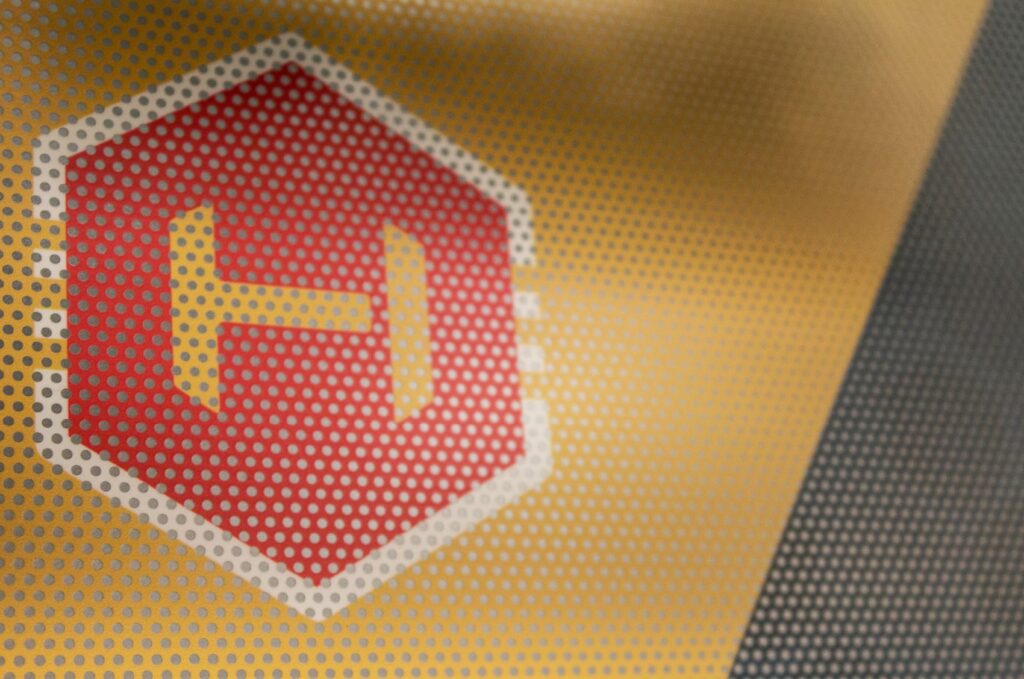 Detail of The Hive logo printed on a window graphic.