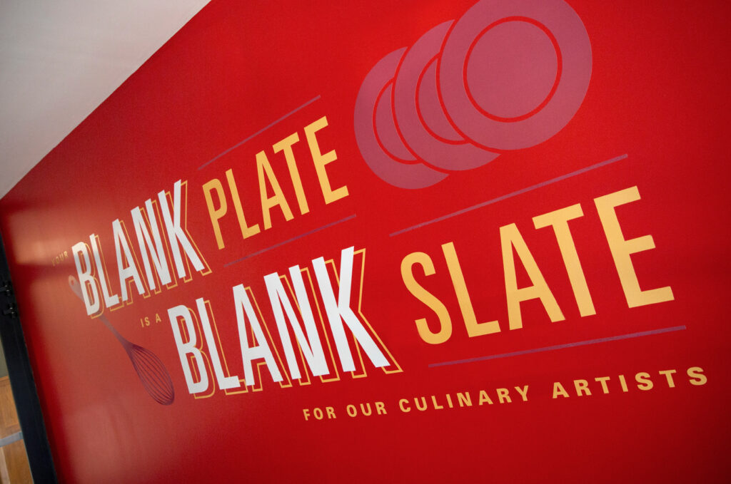 Environmental design for ISU Dining, featuring wall graphics that declare, "Your blank plate is a blank slate for our culinary artists."