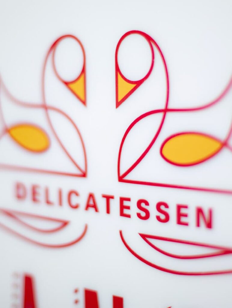 Close-up of the Lance and Ellie's Delicatessen logo design.