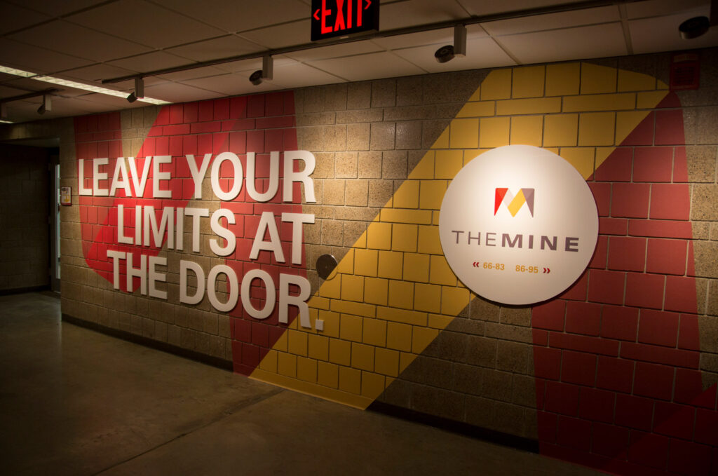 Environmental and branded design for ISU's Department of Mechanical Engineering, featuring logo and graphics for The Mine