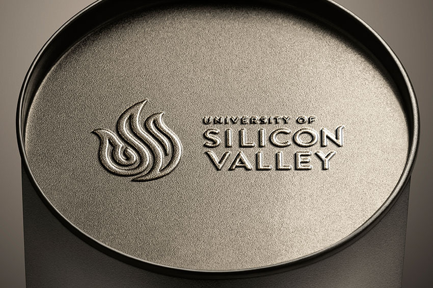 USV logo stamped into metal for a water bottle.