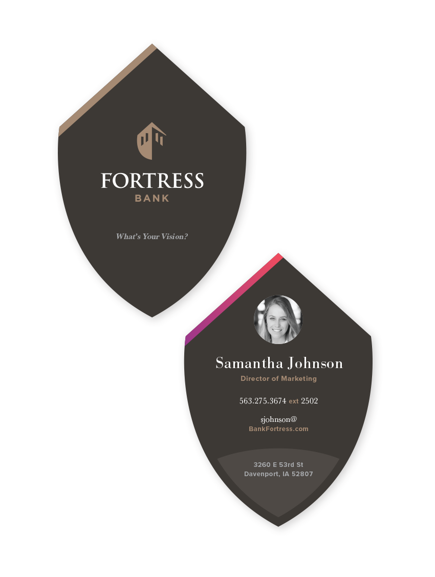 Employee business cards for Fortress Bank, which are cut into the shield shape of the logo.